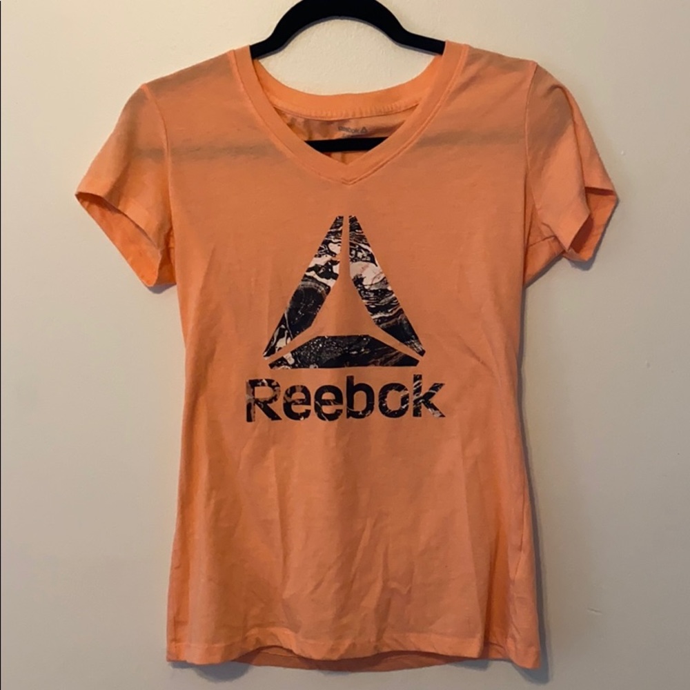 Salmon colored reebok tee